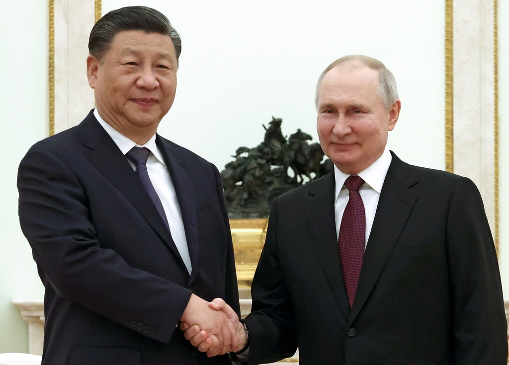 El presidente Putin recibe al mandatario chino en Moscú