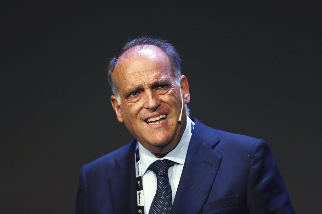 FILE - Javier Tebas, the president of the Spanish La Liga speaks during the World Football summit in Madrid, Spain, Monday, Sept. 24, 2018. Repeated racist insults against Real Madrid's Brazilian soccer star Vincius Junior have unleashed a heated debate in Spain about tolerance for racism in a society that is becoming rapidly more diverse on and off the field. Immediately following Sunday's incident, La Liga President Javier Tebas criticized the player for attacking the league, saying Vinicius didn't show up for talks on the subject of racism that he himself had requested.