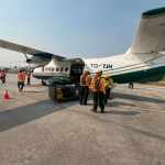 Personal de la CONRED se prepara para el sobrevuelo en áreas donde hay incendios activos en el parque nacional Laguna del Tigre, Petén. Foto: Conred/La Hora
