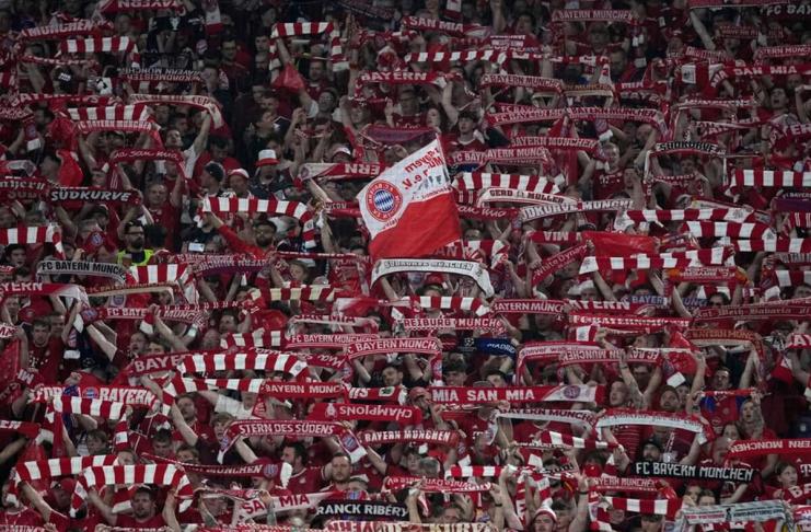 Bayern Munich fans cheer ahead of the Champions League semifinal first leg soccer match between Bayern Munich and Real Madrid at the Allianz Arena in Munich, Germany, Tuesday, April 30, 2024. (AP Photo/Matthias Schrader)