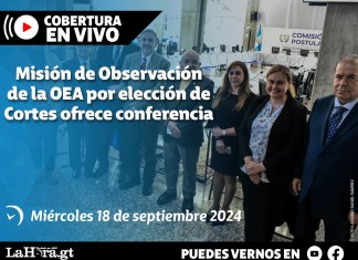 Integrantes de la Misión de Observación Especial de la OEA posan para una fotografía desde la Universidad Rafael Landívar