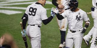 New York (United States), 30/10/2024.- New York Yankees Gleyber Torres (R) is greeted by New York Yankees center fielder Aaron Judge (L) after hitting a three-run home run during the eighth inning of game four of the Major League Baseball (MLB) World Series between the American League Champion New York Yankees and the National League Champion Los Angeles Dodgers at Yankees Stadium in the Bronx borough of New York, New York, USA, 29 October 2024. The World Series is the best-of-seven games. (Nueva York) EFE/EPA/CJ GUNTHER