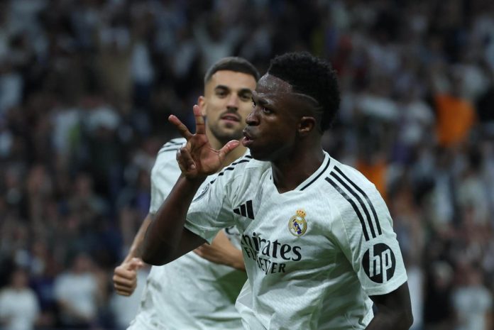 Vinicius Jr. celebra durante el encuentro correspondiente a la fase regular de la Liga de Campeones. Foto La Hora: EFE/Kiko Huesca