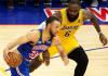 Fotografía de archivo en la que se registró al base estrella de los Warriors de Golden State, Stephen Curry (i), al intentar superar la marca del alero estrella de los Laker de Los Ángeles, LeBron James (d), durante un partido de la NBA, en el coliseo Chase Center de San Francisco Foto La Hora: EFE