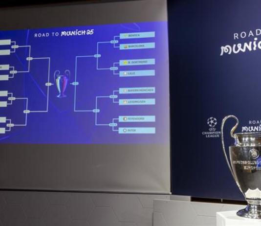 El cuadro de eliminatorias se muestra en un panel electrónico junto al trofeo de la UEFA Champions League después de los sorteos de octavos de final, cuartos de final y semifinales de la UEFA Champions League, en la sede de la UEFA en Nyon, Suiza, el 21 de febrero de 2025. Foto La Hora: EFE