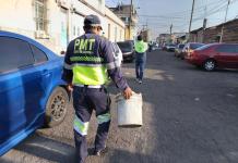 Adiós a los botes, piedras y llantas para «apartar» parqueo en la ciudad Foto La Hora: EMETRA