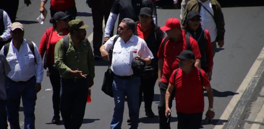 Joviel Acevedo fue escoltado durante la marcha. Foto La Hora: José Orozco.