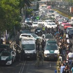 La policía acordona el área donde la secretaria privada de la alcaldesa de la Ciudad de México, Ximena Guzmán, y el asesor José Muñoz fueron asesinados en la Ciudad de México, el martes 20 de mayo de 2025. Foto La Hora: AP.