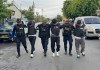 Armas, chalecos y equipo táctico incautado a los presuntos sicarios de la MS-13.