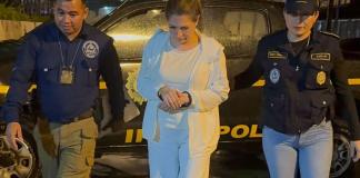 Carol Echeverría fue trasladada a Torre de Tribunales para ser puesta a disposición de juez. Foto La Hora: PNC