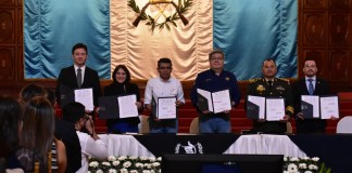 Firma interinstitucional del Programa Nacional de Seguridad de la Aviación Civil.