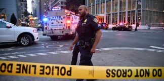 Policía fallecido tras tiroteo en Manhattan se encontraba fuera de servicio.