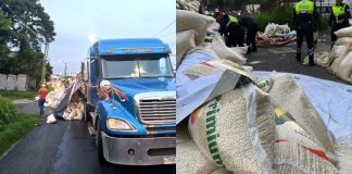 Tráiler deja su carga tirada sobre el km 16 hacia la ciudad capital, obstruyendo el paso en el carril derecho.
