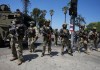 Agentes federales de ICE en MacArthur Park, Los Ángeles. Foto La Hora: AP