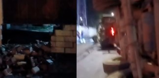 El conductor de un tráiler volcó en zona 4 de Mixco, lo que provocó daños en la infraestructura de una vivienda. Foto Joyce Cuevas