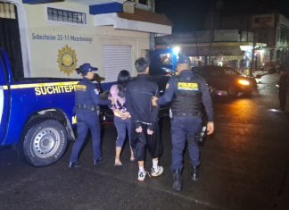 Pareja de presuntos extorsionistas de la Mara 18 son detenidos por dar muerte a un piloto de camión. Foto La Hora: Policía Nacional Civil (PNC)