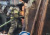 Bombero Voluntario apagando fuego