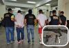 Hombres capturados por presuntamente transaccionar armas de fuego en un centro comercial de Villa Nueva. Foto La Hora: PNC