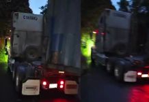 Tráiler averiado en el km 34 de la ruta a Santa Elena Barillas. Foto La Hora: Captura de pantalla