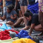 Una mujer llora frente a cuerpos sin vida en una calle este miércoles, en Río de Janeiro (Brasil). La operación policial lanzada el martes en Río de Janeiro, la más letal de la historia de la ciudad brasileña, dejó 132 muertos, entre ellos cuatro agentes, informó este miércoles a EFE la Defensoría Pública regional. Foto: La Hora: EFE