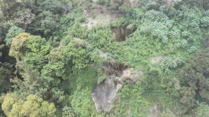 Vista aérea del socavamiento en el km 25.5. FotoLa Hora: Conred.
