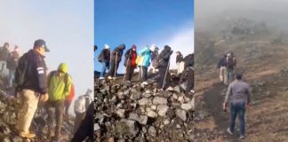 Turistas escalando cráter prohibido. Foto La Hora: captura de pantalla.