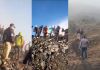 Turistas escalando cráter prohibido. Foto La Hora: captura de pantalla.