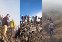 Localizan grupos de turistas con guías no autorizados escalando cráter MacKenney Turistas escalando cráter prohibido. Foto La Hora: captura de pantalla.