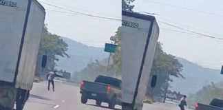 Imágenes del momento del ataque armado registrado en el kilómetro 32.5 de la ruta al Pacífico. Foto La Hora: Captura de pantalla