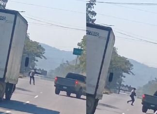 Imágenes del momento del ataque armado registrado en el kilómetro 32.5 de la ruta al Pacífico. Foto La Hora: Captura de pantalla