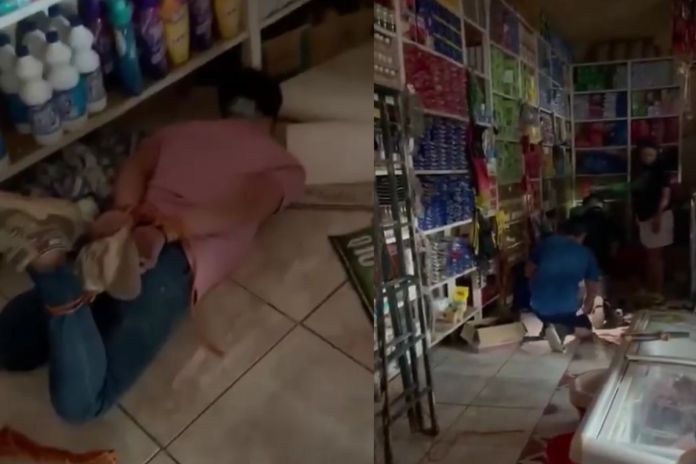 Hombres amordazados tras asalto de una tienda en Pasaco, Jutiapa. Foto La Hora: Captura de pantalla