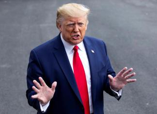 Agentes de ICE durante un operativo en Mineápolis, en medio de protestas y demandas contra el Gobierno de Trump.