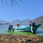 Extracción de residuos, desechos sólidos y plantas acuáticas, del lago de Amatitlán. Foto La Hora: AMSA.