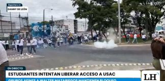 Afines al rector Walter Mazariegos se han enfrentado con estudiantes de distintas unidades académicas de la Usac que buscan ingresar al campus central. Foto la Hora