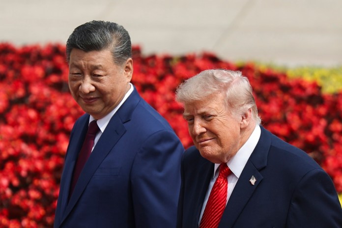 Presidente de China, Xi Jinping (i), junto a su homólogo estadounidense, Donald Trump, (d) durante su visita de Estado. Foto La Hora: EFE