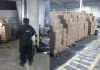 Hondureño pretendía ingresar a Guatemala con Q238 mil en botellas de licor de supuesto contrabando. Foto La Hora: PNC.