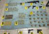 PNC incauta 10 armas de fuego enviadas desde EE. UU., que pretendían ser recibidas en Huehuetenango PNC y las 10 armas incautadas en Puerto Barrios, Izabal. Foto La Hora: PNC