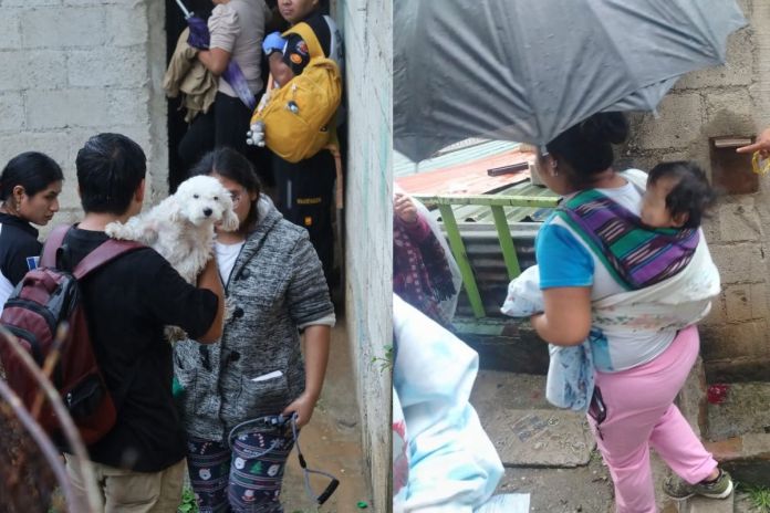 Personas evacuadas por el deslizamiento de tierra registrado en la zona 5 capitalina. Foto La Hora: Bomberos Voluntarios