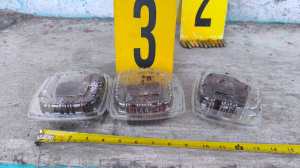 Cajas con brownies presuntamente hechos con marihuana. Foto: PNC.