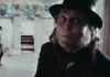 Johnny Depp como Ebenezer Scrooge