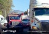 Una caravana de transporte pesado se dirige hacia el Centro Histórico como protesta ante el alza de los precios de los combustibles.