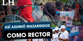 La jornada en la que Walter Mazariegos se impuso nuevamente como rector, pese al finiquito o el fraude. Con manifestación de grupos estudiantiles en contra y aquellos a favor de él. Foto La Hora: José Orozco