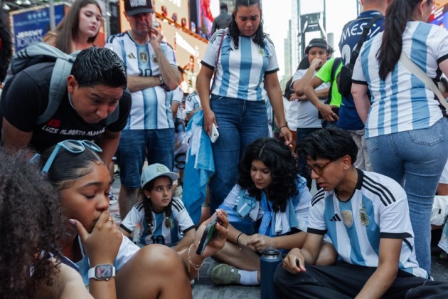 Argentina fans react after Spain's victory over Argentina in the 2026 FIFA World Cup final match in Times Square in New York, New York, USA, 19 July 2026.