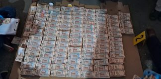 Q1 millón y medio decomisados en allanamiento del Ministerio Público y Policía Nacional Civil. Foto La Hora: MP