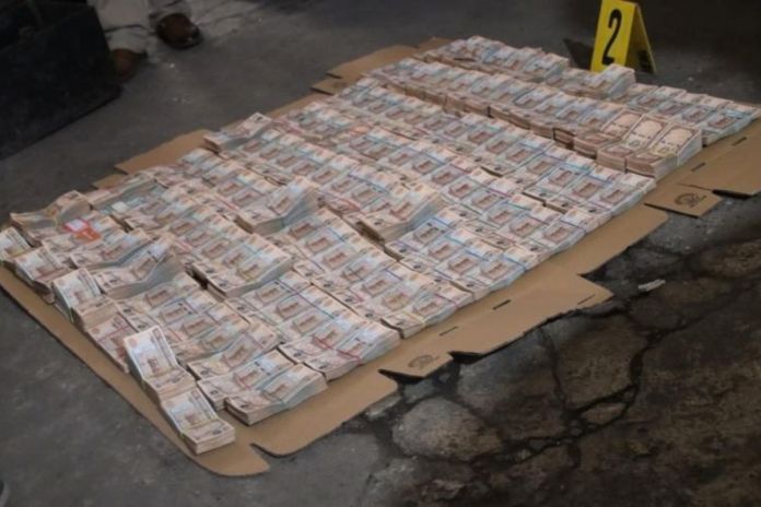 Dinero en efectivo incautado durante operativos en contra de grupos criminales Dinero en efectivo incautado durante operativos en contra de grupos criminales. Foto La Hora: Mingob